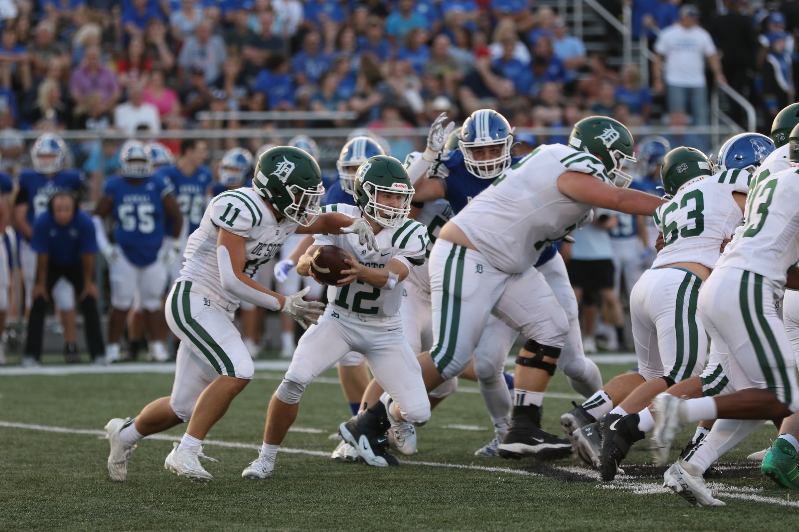 Carson Miller playing football