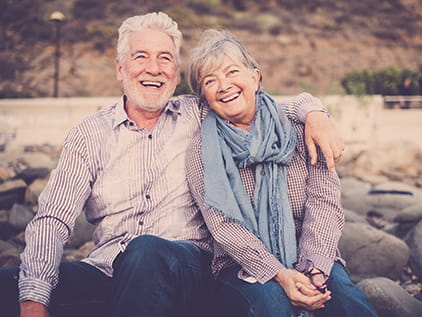 Happy couple outside.